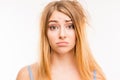 Upset girl with problem hair Royalty Free Stock Photo