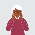 Upset grandmother cries and holds his head with his hands. The concept of resentment, pain and depression.