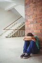 Upset lonely child sitting by himself Royalty Free Stock Photo