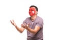 Upset loser fan support of Tunisia national team with painted face isolated on white background