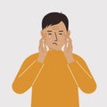 Upset man cries and holds his head with his hands. The concept of resentment, pain and depression.