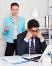 Upset man with disgruntled boss Royalty Free Stock Photo