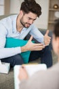 upset man talking to therapist Royalty Free Stock Photo