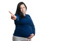 Upset pregnant woman making negative gesture with finger