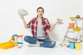 Upset sad woman holds bundle of cash money, supermarket grocery push cart for shopping. Instruments for renovation