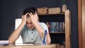 Upset schoolboy doing homework Royalty Free Stock Photo