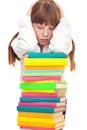 Upset schoolgirl with books