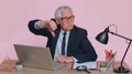 Upset senior business man showing thumbs down sign gesture, disapproval, dissatisfied, dislike Royalty Free Stock Photo