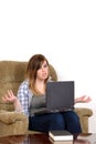 Upset teen girl with laptop and copy space Royalty Free Stock Photo