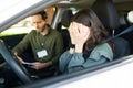 Upset teenage girl crying in the car because she failed the test Royalty Free Stock Photo