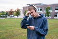 Upset teenager listening to music.