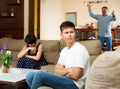 Upset teenager and mother with scolding father Royalty Free Stock Photo