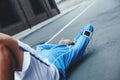 tired athlete lying on the street after bad workout session Royalty Free Stock Photo