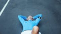 tired athlete lying on the track on the street after failed running session