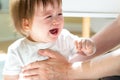 Upset toddler boy crying in his house Royalty Free Stock Photo