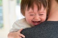 Upset toddler boy crying in his house Royalty Free Stock Photo