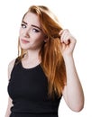 Upset woman with dry damaged hair. Royalty Free Stock Photo