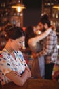 Upset woman ignoring affectionate couple Royalty Free Stock Photo