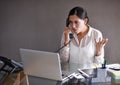 Upset, woman and phone call in home office for conversation on work, frustrated and speaking on business for networking Royalty Free Stock Photo