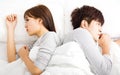 Upset young couple lying side by side Royalty Free Stock Photo