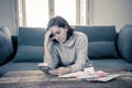 Upset young woman stressed about credit card debts and payments not happy accounting finances Royalty Free Stock Photo