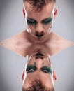 Upside down dual casual man with makeup