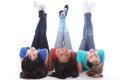 Upside down fun for three student girl friends Royalty Free Stock Photo