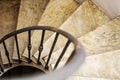 Upside view of indoor spiral winding staircase Royalty Free Stock Photo