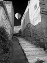 Upstairs to the light - stone stairs to the open air freedom and light with flying balloon Royalty Free Stock Photo