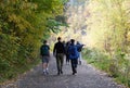 Upstate New York, U.S - October 15, 2022 - A group of visitors walking on the nature trail of Taughannock Falls State Park