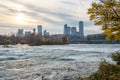 Upstream of Niagara Falls from Goat Island Niagara Falls State Park, USA with downtown Niagara Falls City, Canada in background,