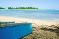 Upturned boat on beach. Royalty Free Stock Photo