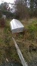 Upturned boat beside the sea