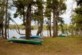 Upturned canoes by lakeside Royalty Free Stock Photo