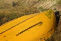 Upturned yellow row boat Royalty Free Stock Photo