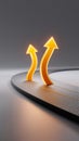 Upward arrows rise from curved path symbolizing progress and growth. The minimalistic grey backdrop emphasizes the Royalty Free Stock Photo