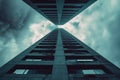 an upward shot of a high rise building with a cloudy sky Royalty Free Stock Photo