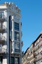 Upward view on classical vintage buildings in art deco style downtown Madrid, Spain. Spanish baroque architecture Royalty Free Stock Photo
