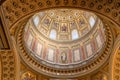 Upward view of gilded golden dome cupola inside St. Stephen`s Basilica in Budapest Royalty Free Stock Photo