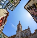 Upward View of an Ornate Cathedral Spire Against a Clear Blue Sky in Bilbao, Spain, a Historical European City