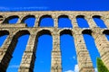 Upward view of the Roman Aqueduct of Segovia, Spain Royalty Free Stock Photo