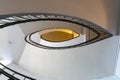 Upward view to oval narrow spiral staircase Royalty Free Stock Photo