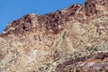 Upward view of the towering Chinle formations near Cassidy Arch at Capitol Reef National Park, Utah, USA Royalty Free Stock Photo