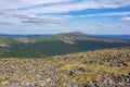 Ural mountains with huge boulders on the hillsides. beautiful summer landscape in good weather