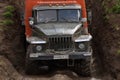 Ural - Russian off-road extreme expedition truck driving on mountain road, transportation travelers