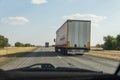 Heavy vehicles on Kazakhstani highways. Truck overtaking on the highway. Truckers.