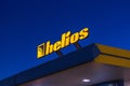 Helios gas station at night, big logo of Helios company in Kazakhstan