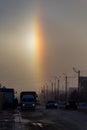 An unusual natural phenomenon is a halo, an atmospheric optical phenomenon around the sun in the early morning Royalty Free Stock Photo