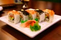 Uramaki rolls with tuna and salmon served on a white plate. Beijing, China.