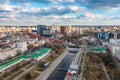 Urban aerial view of beautiful and scenic downtown with modern buildings and clouds.